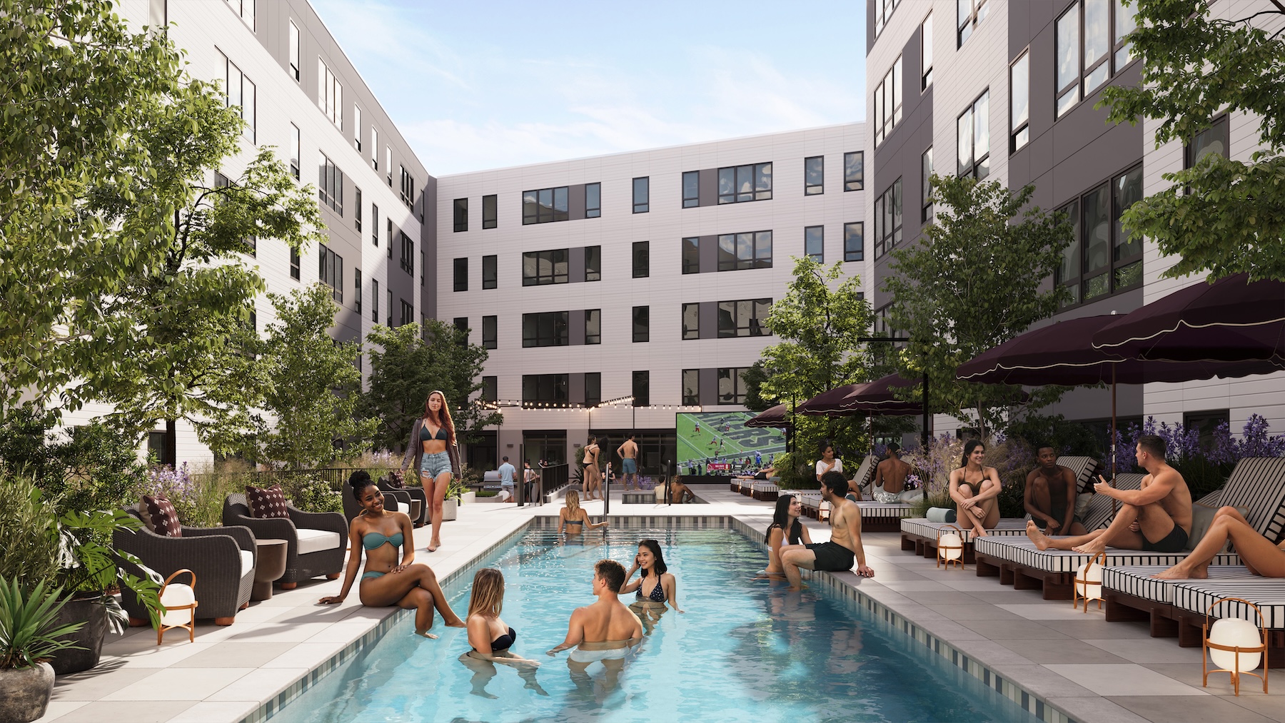 Rambler Riverfront pool courtyard with the jumbotron playing the Purdue Boilermakers football game