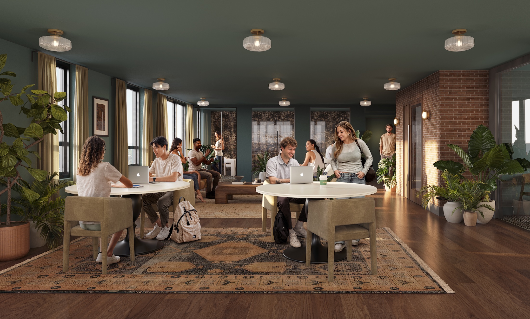 Purdue University students studying and working in one of the Rambler Riverfront study spaces
